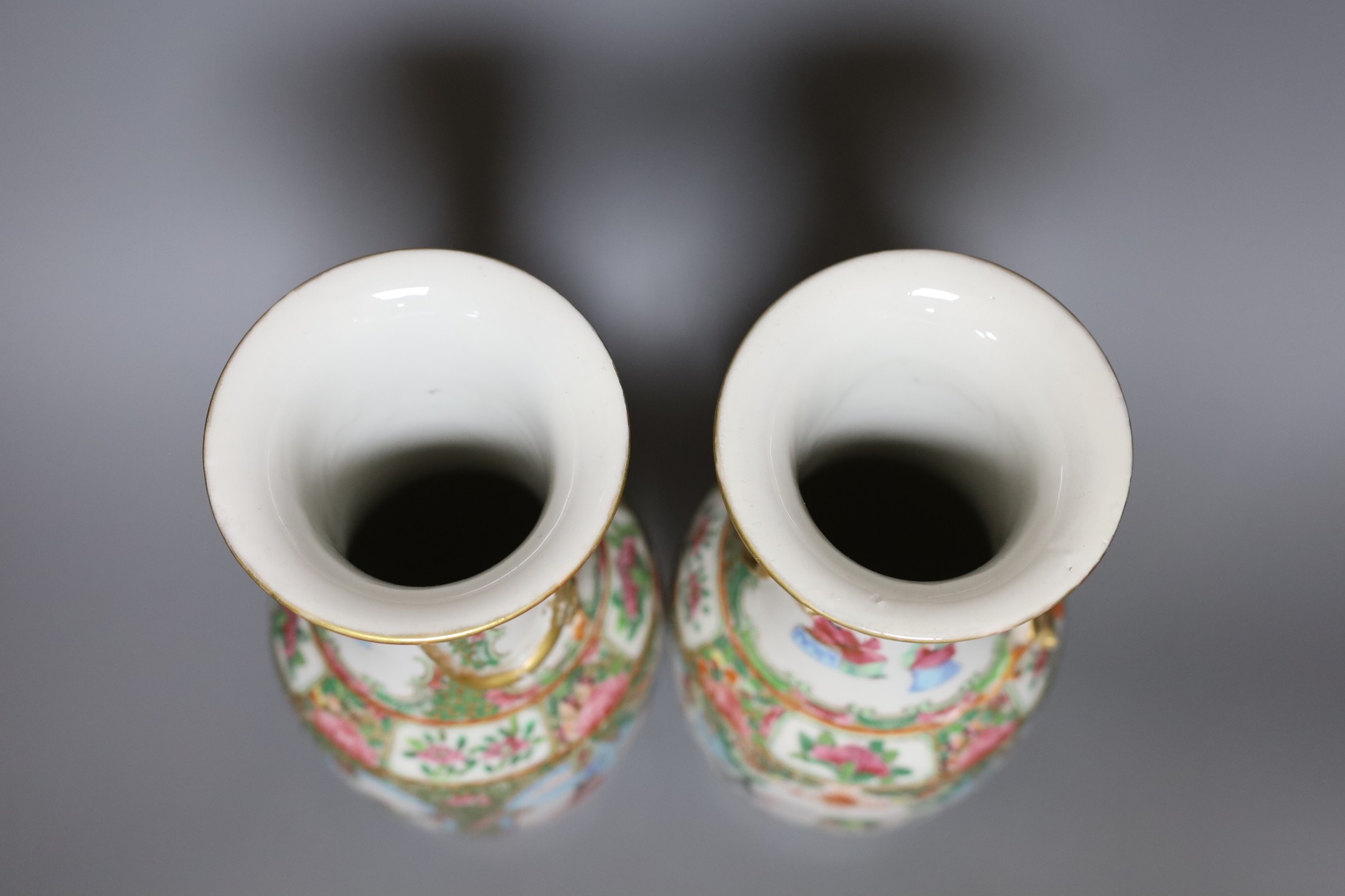 A pair of 19th century Chinese Canton ceramic vases, 25.5cm tall